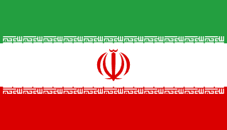 The flag of Iran is composed of three equal horizontal bands of green, white and red. A red emblem of Iran is centered in the white band and Arabic inscriptions in white span the bottom edge of the green band and the top edge of the red band.