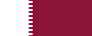 The flag of Qatar has a maroon field, on the hoist side of which is a white vertical band that spans about one-third the width of the field and is separated from the rest of the field by nine adjoining fly-side pointing white isosceles triangles that serve as a serrated line.